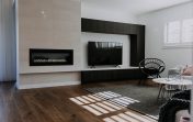 09 Alatalo Bros - custom homes - home features - smart lighting - Alexa - Google home - custom designed cabinets - entertainment units - fire place feature